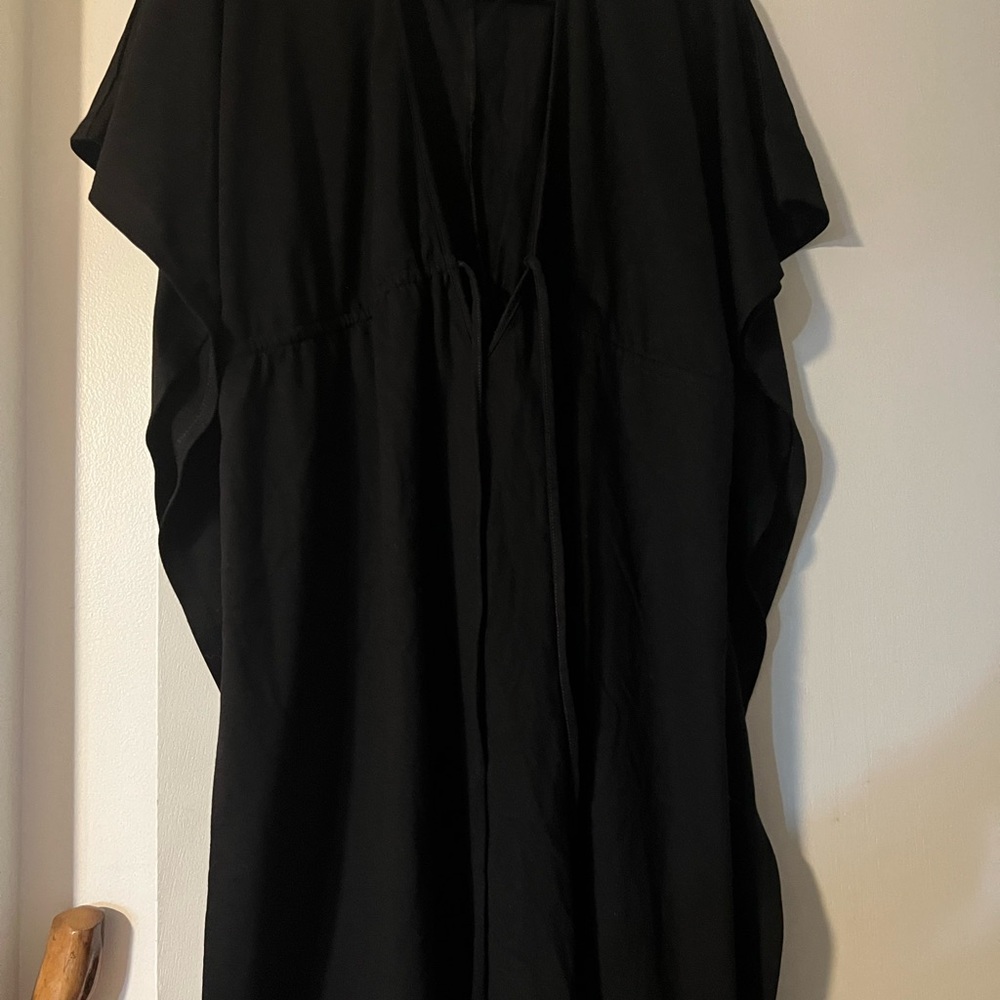WOMAN’S COVER ALL